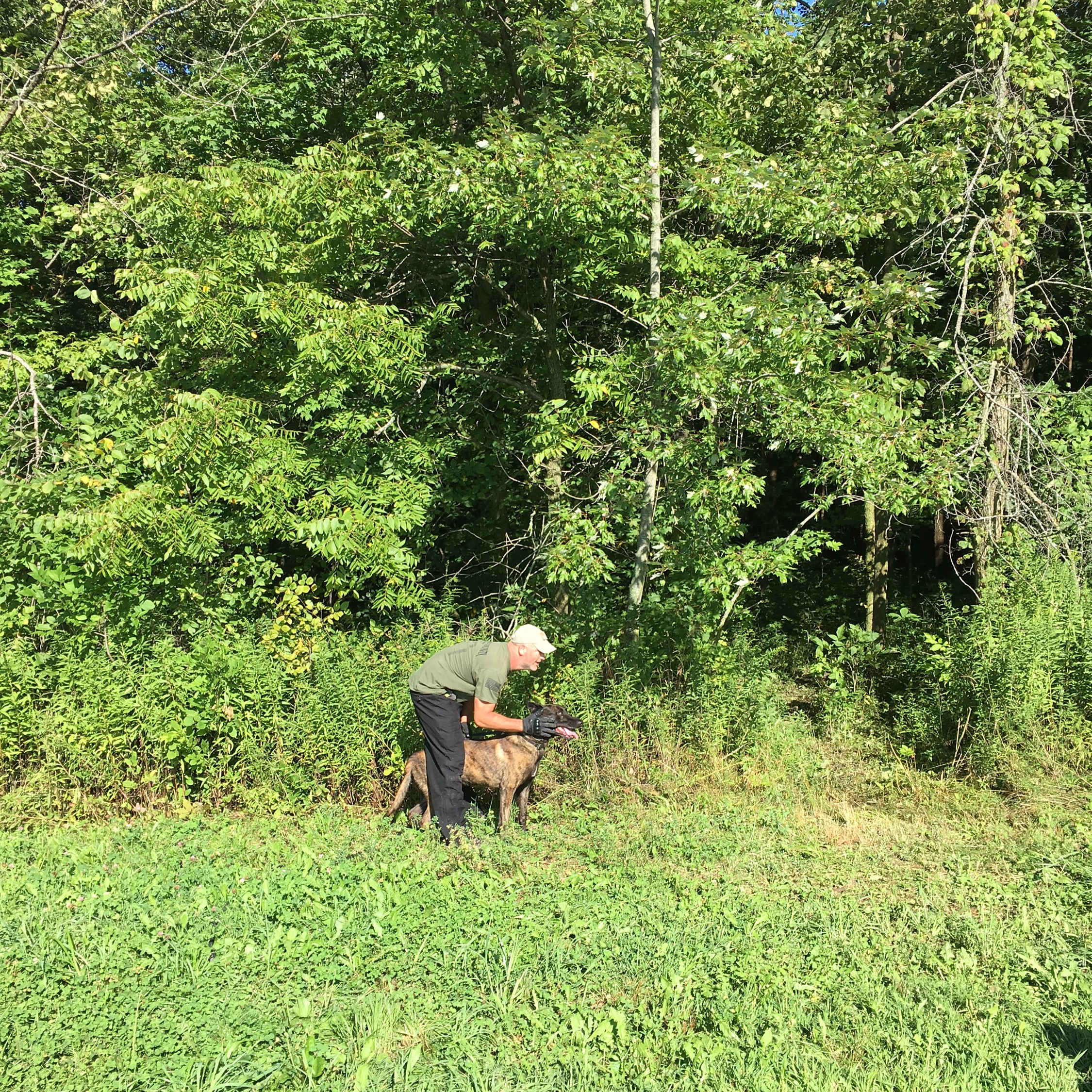 Officer Demello and K9 Roy.JPG